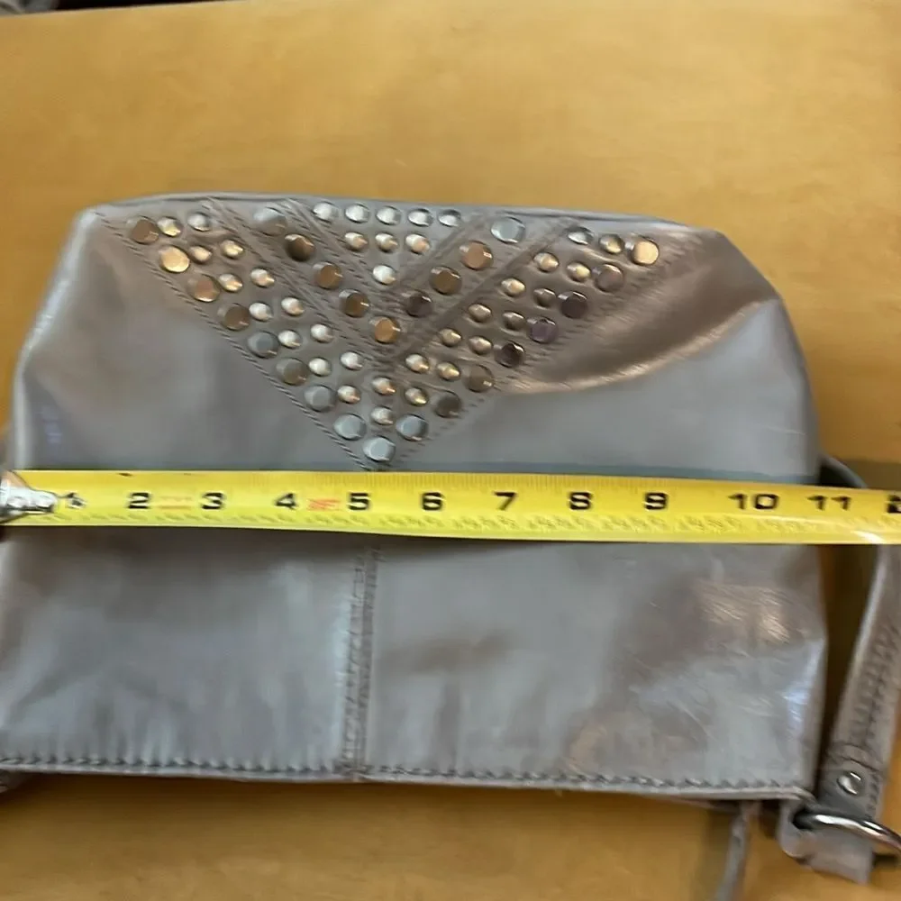 The Sak Indio Grey Leather Studded Hobo Bag With Tassel